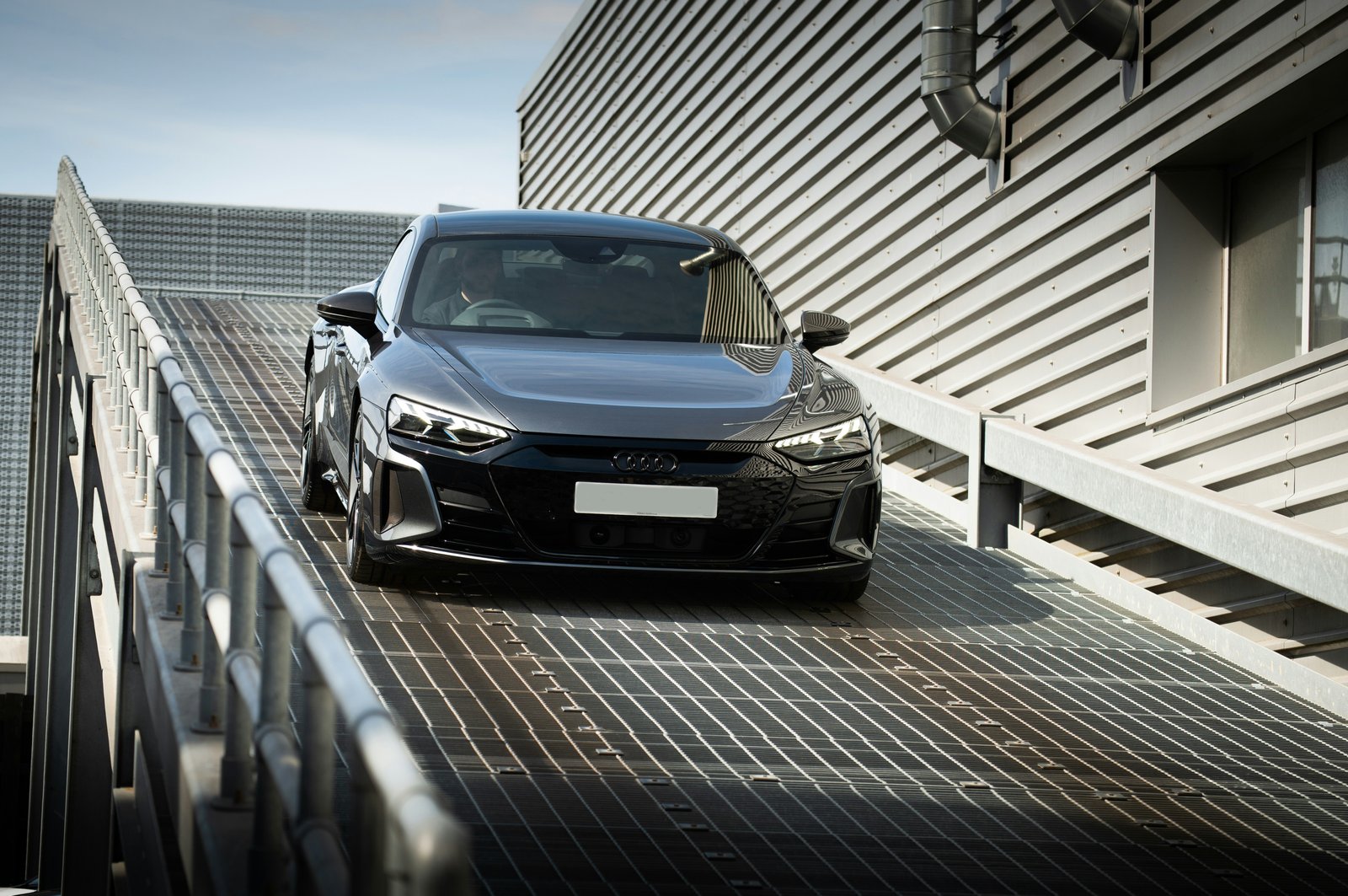 A truck carrying cars